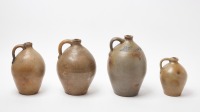 Four Ovoid Stoneware Jugs