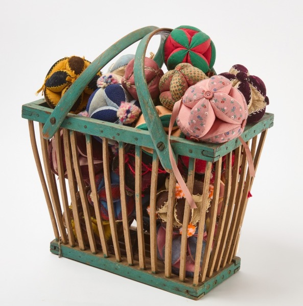 Collection of Pin Cushions in a Blue and Taupe Painted Basket