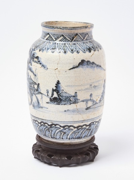 Chinese Porcelain Vase on Wood Stand