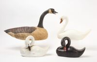 Three Carved Swans and One Goose