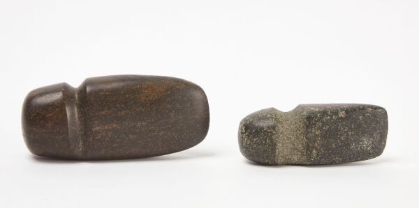 Two Grooved Stones