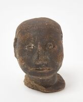 Sewer Tile Head of a Man
