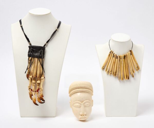 Collection of Tribal Fishing Hooks, Bone Mask, and Bear Claw Amulet