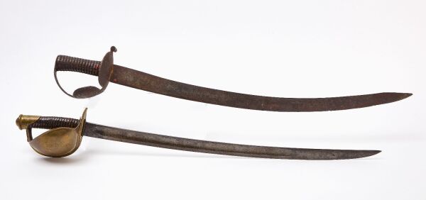 Two Navy Cutlasses