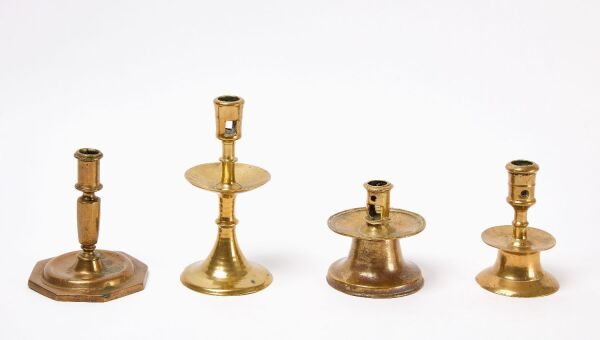 Group of Early Brass Candlesticks