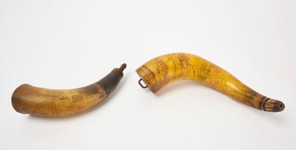 Two Carved Powder Horns